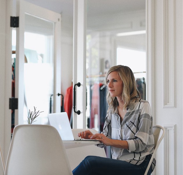 feeling the effects of inflation workers comp lady sitting down at computer