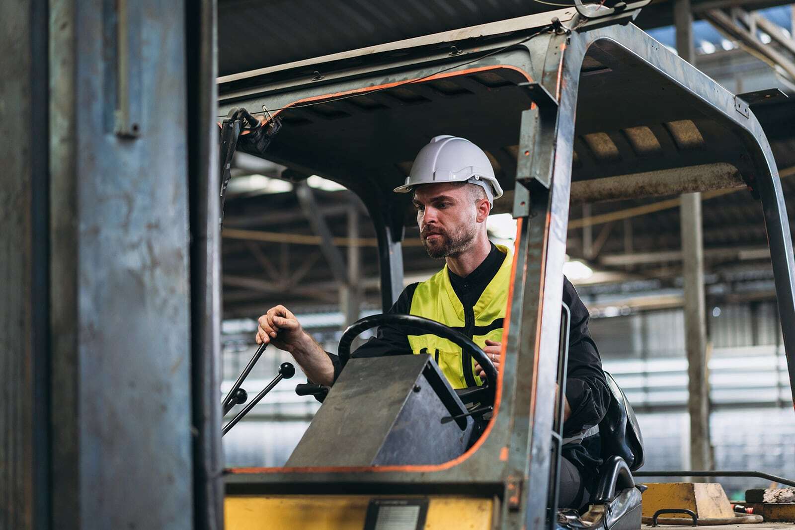 industrious-engineer-operating-forklift-in-warehou-2026-03-25-01-36-51-utc