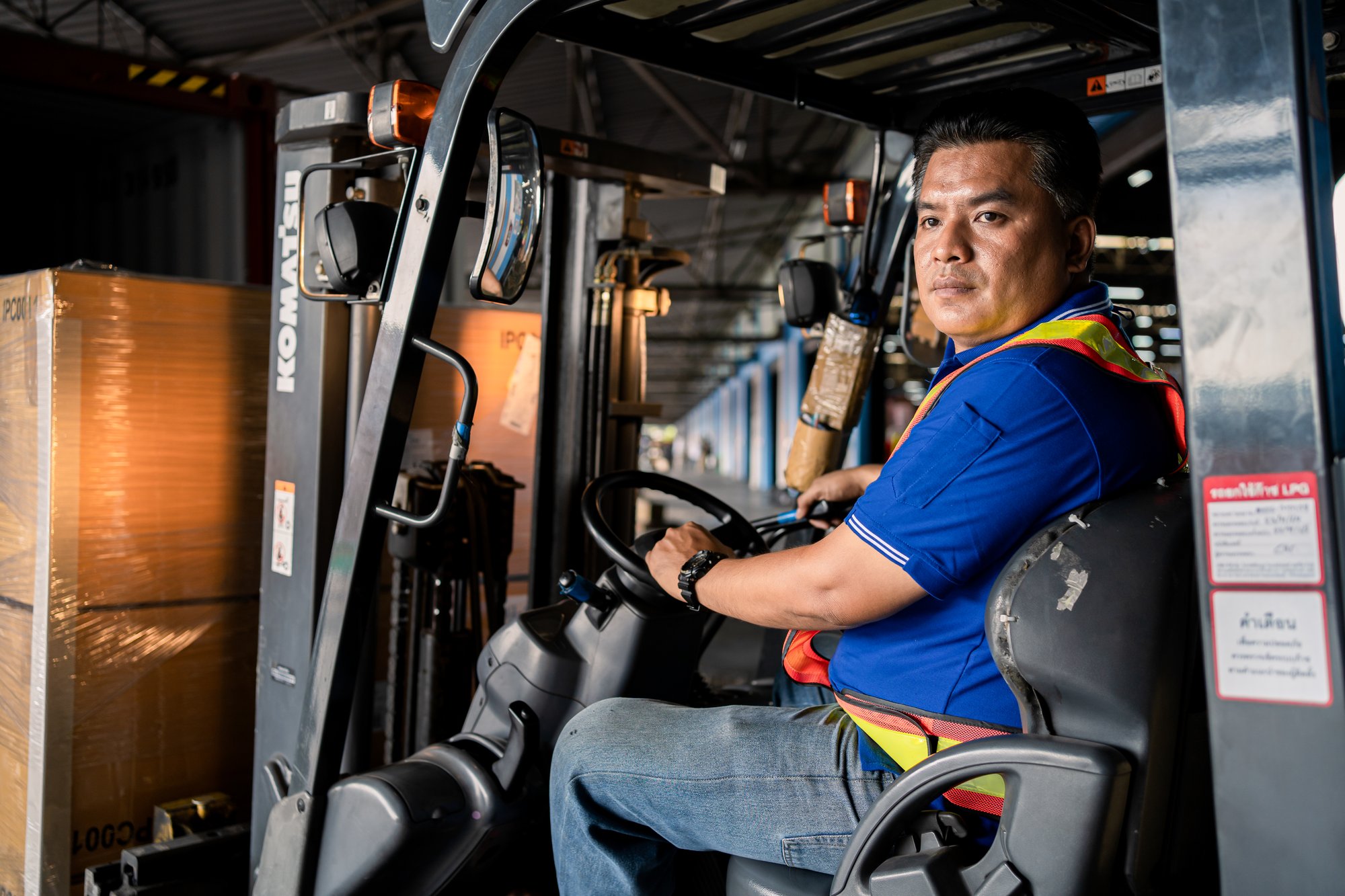 Certified forklift operator at work, the highest-return skill for warehouse pay in Utah