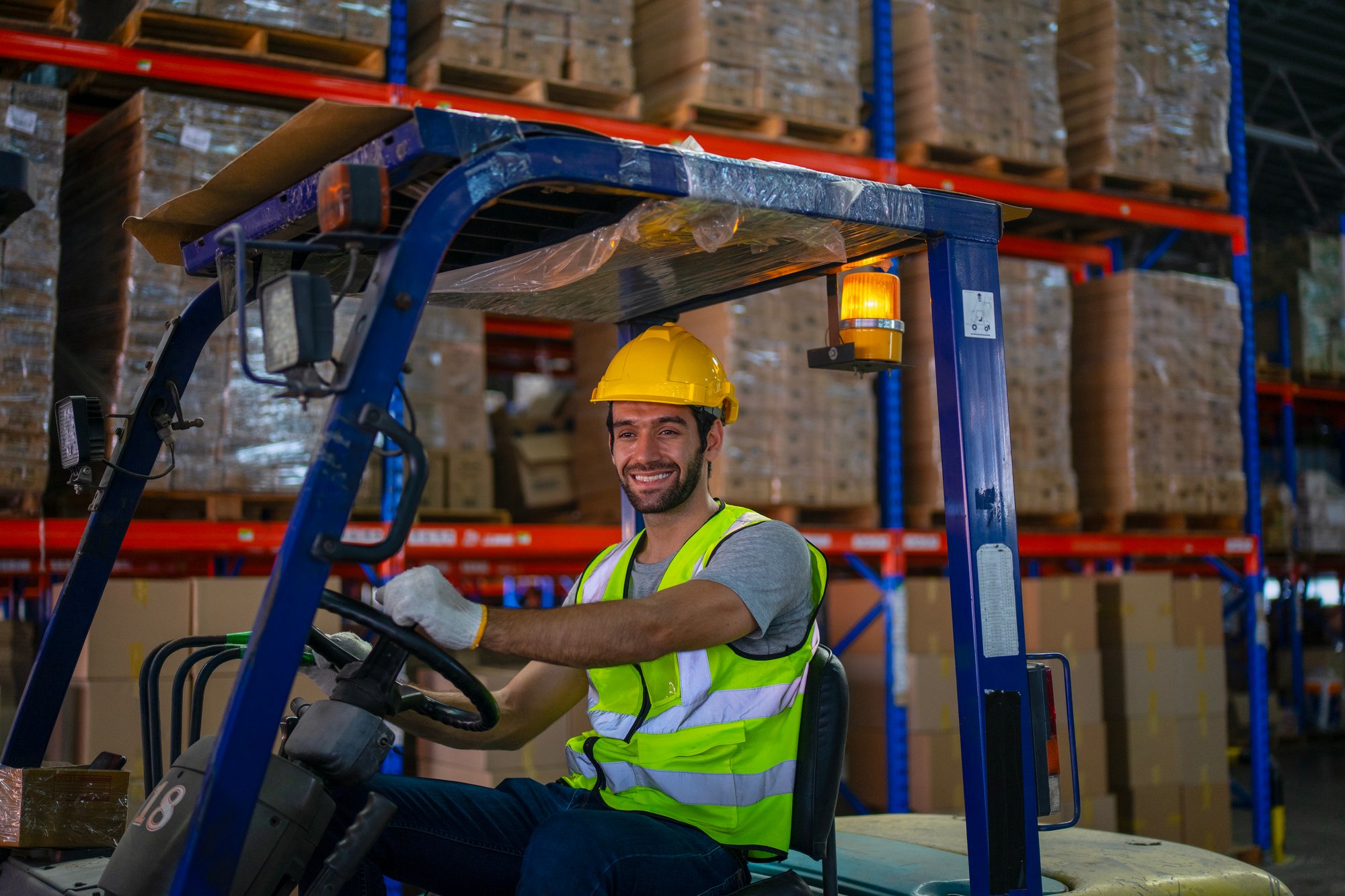 Warehouse worker on a night shift, the schedule that fills last and pays most during peak season